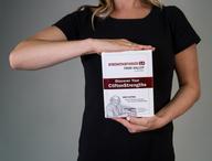 Person holding StrengthsFinder 2.0