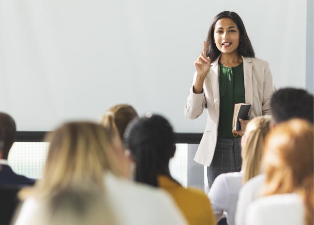 Instructor standing in front of class