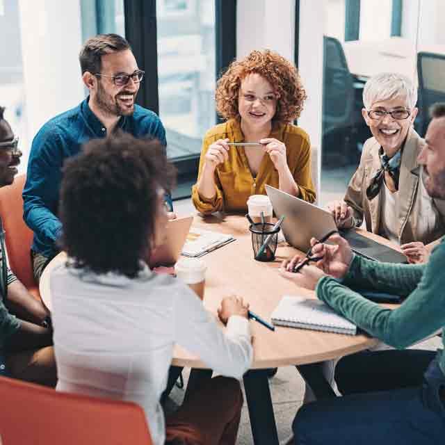 image of employees working together