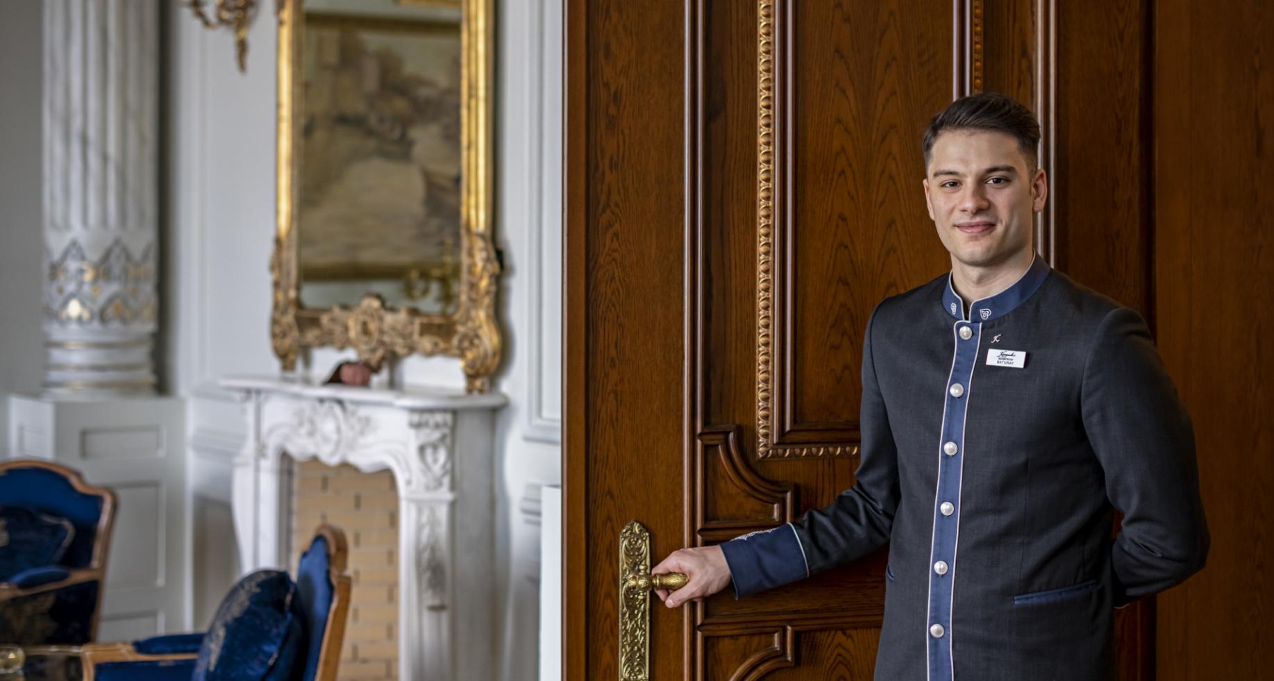 Employee Opening the Door to an Amazing Hotel Room