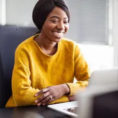 A woman completing online courses.