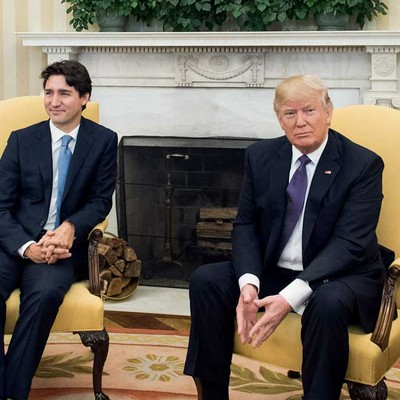 Migrant Acceptance in Canada, U.S. Follows Political Lines